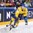 COLOGNE, GERMANY - MAY 20: Sweden's Elias Lindholm #28 pays the puck while Finland's Topi Jaakola #6 defends during semifinal round action at the 2017 IIHF Ice Hockey World Championship. (Photo by Andre Ringuette/HHOF-IIHF Images)

